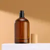 Botella de spray de perfume con prensa de bayoneta redonda color canela, 30 ml, 50 ml y 100 ml, venta al por mayor.