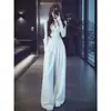 Conjunto de mujer estilo coreano: un conjunto completo para primavera y otoño, que incluye un top de manga larga y pantalones de pierna ancha con bolsillos y cordones, disponible para venta al por mayor