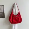 Bolsa de Nylon de Alta Qualidade Estilo Casual Preguiçoso Formato de Dumpling Feminina Verão 2026 Novo Pequeno Design de Nicho Bolsa de Ombro Único para o Dia a Dia