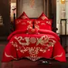 Bordado de algodón de alta gama 140 rojo boda juego de cuatro piezas dote dragón y fénix categoría de cama de algodón al por mayor