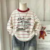 Camiseta de manga larga a rayas de algodón puro para niñas, nueva versión primavera y otoño 2026, estilo coreano, top casual versátil, camiseta básica para niños