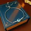 Pulsera Flor de Circonita Chapada en Oro Real Nicho Dulce Versátil Pulsera Temperamento Lujo Ligero Joyería de Gama Alta para Mujeres Al Por Mayor