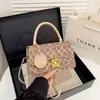 Bolso de Mano Cruzado para Mujer 2026 Otoño Popular Nicho Versátil Retro Bolso de Hombro Bolso para el Trabajo