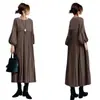 En stock. Tela de alta calidad. Nueva colección Otoño/Invierno 2026 estilo japonés: vestido largo con cuello redondo, mangas de farol y bajo plisado