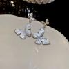 Pendientes de plata con forma de mariposa y flor de perla retro francesa, pequeños y exquisitos, de alta gama, con diseño de hada súper dulce para mujer.