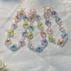 Cordón para teléfono móvil Cadena corta para muñeca Hecho a mano con cuentas Colgante de flor pequeña Exquisita pulsera de flores coloridas para mujer