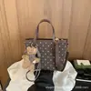 Bolsa de Mão Estilo Coreano Retrô tipo Balde Feminina 2026 Novo Estilo para o Dia a Dia Versátil Casual Bolsa Transversal