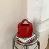 Bolso tipo cubo único y elegante para mujer, nueva versión coreana primavera 2026, bolso de hombro simple, bolso cruzado casual de moda