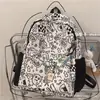 Mochila feminina ins má avaliação estilo Harajuku japonês grafite personalizado mochila para estudante universitário mochila simples versátil moda feminina