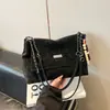 Bolsa retrô com textura de alta qualidade feminina 2026 nova popular versátil bolsa transversal com corrente bolsa de ombro tote de grande capacidade