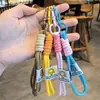 Estilo Minimalista Feito à Mão Corda Trançada Bloqueio de Cores Cordão Chaveiro Capa de Celular Alça de Pulso Portátil DIY Tendência Acessório de Nicho