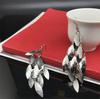 Pendientes baño metálico pendientes largos exagerados Europa y Estados Unidos pendientes simples de hoja multicapa suministro de comercio exterior transfronterizo