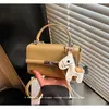 Bolso Pequeño Elegante de Alta Gama con Textura para Mujer 2026 Nueva Moda Bolso Cruzado Versátil Bolso de Mano Exquisito Súper Moderno Bolso Cuadrado Pequeño