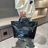 Bolsa de gelatina grande e versátil na moda, bolsa de mão impermeável de papel DuPont estilo coreano, sacola de compras simples