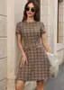 Vestido de punto elegante a cuadros con cuello redondo y manga larga para mujer, nuevo de otoño e invierno 2026, transfronterizo europeo y americano