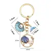 Llavero de concha, estrella de mar, caracola transfronterizo, colgante de dibujos animados de aleación y esmalte, colgante de regalo para bolsos y llaves de niñas