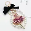 Chaveiro de Menina Bailarina Nova Moda Estilo Coreano Exclusivo Laço Pérola Chaveiro Pingente de Bolsa