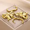 Brincos de aço inoxidável novos transfronteiriços brincos com pingente de laço feminino brincos brincos banhados a ouro uma geração de cabelo