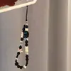 Venta al por mayor del fabricante Nuevo modelo Gato Kt Lazo Cadena para teléfono Colgante de cadena para teléfono con cuentas hecho a mano Decoración para niñas