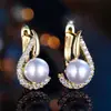 Pendientes Mismo Estilo Cao Shi Dongdaemun, Corea del Sur Exquisitos Curvos Completos de Diamante Falso Perla Pendientes de Lujo Ligero de Alta Gama