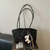 Bolso de axila para mujer estilo vintage para comercio exterior, nuevo modelo de verano 2026, bolso tote de alta calidad, versátil para ir al trabajo, bolso de mano y bolso de hombro