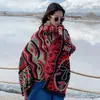 Chal con abertura para viajes de Xizang Rojo Cálido Engrosado Estilo Étnico Estampado Bufanda Capa para Mujer Otoño e Invierno Venta al por mayor