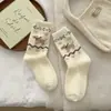 Meias quentes de veludo australiano, meias de cano alto versáteis para mulheres, outono e inverno, espessas e quentes, estilo fair island retro, meias de inverno de cachorrinho
