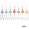Al por mayor en stock 20ml 30ml botellas de aceite esencial de hombro plano esmerilado, botellas de vidrio 40ml 50ml botellas gotero de hombro plano transparentes
