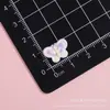 Pajarita Colorida Mini Tamaño Pequeño Clip para Uñas Imán para Nevera Pegamento en Crema Accesorios DIY Parches para Ropa Mayoreo