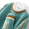 Suéter de lana de cuello redondo con bloques de color para hombre, nuevo suéter de lana de punto para otoño e invierno, suéter grueso holgado y elegante para hombre