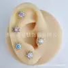 Clavo de Oreja de Titanio Jiang Ti F136 Erizo de Mar Aobao Girasol Transfronterizo G23 Aleación de Titanio Joyería para Perforación Corporal Pendientes