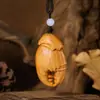 Colgante de calabaza tallada hecho de madera de ciprés chino, un artículo decorativo para coches, bolsos y como adorno decorativo