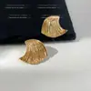 Pendientes de Ola de Moda Estilo Europeo y Americano para Mujer, Diseño Único con Textura, Pendientes Transfronterizos de Lujo Ligero de Gama Alta de Nicho