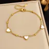 Tobillera en forma de corazón con cuentas blancas, cadena de doble capa chapada en oro, una tobillera elegante y versátil con un toque lujoso, un artículo muy vendido en Temu
