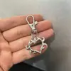Llavero de Herradura de Metal Plateado Diseño de Nicho Llavero Personalizado para Pareja Colgante para Bolso Venta Directa de Fábrica