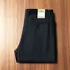 Pantalones Casuales Rectos de Fibra de Lyocell Transpirable Fina para Hombre 2025 Verano Tencel Elegante Sin Planchar Ropa de Trabajo de Negocios
