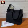 Fábrica de Bolsas del Norte Bolsas de Lona Directas Bolsas para Mujer Nuevas Populares en Internet Bolso de Hombro Sencillo Gran Capacidad Bolsas de Tote ins