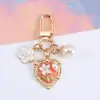 Llavero Colgante de Perla Corazón Flor para Llaves Funda para Auriculares Bluetooth AirPods Llavero Decoración de Bolso de Pareja