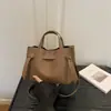 Comércio exterior moda europeia e americana retrô transfronteiriço para o dia a dia casual estilo coreano novo plissado grande capacidade simples bolsa de ombro transversal