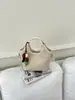 Bolso de cubo de diseño de nicho transfronterizo para mujer, bolso nuevo retro súper popular para el día a día, bolso versátil de un solo hombro cruzado, moderno