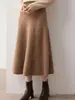 Estilo simple y elegante, falda midi de punto de cachemira pura para mujer, de cintura alta, adelgazante, versátil y adecuada para el trabajo