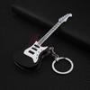 BD20-1 nuevo encendedor de personalidad creativa exótica en forma de guitarra pequeña inflable de llama abierta puesto de mercado nocturno venta caliente al por mayor