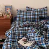 Juego de cuatro piezas de algodón lavado con gasa fruncida de cuadros simples Clase A, juego de tres piezas de gasa de doble capa a rayas de color liso estilo ins para dormitorios estudiantiles
