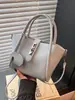Bolso de Mano Retro Francés de Nicho para Mujer 2026 Nuevo Verano Versátil de Moda Bolso Cubo Bolso de Hombro Único Cruzado
