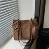 2026 Nuevo Corduroy de Puntos Estilo Coreano Gran Capacidad para Viajes Dulce Fresco Simple Bolso de Hombro