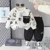 Conjunto de otoño 2026 para niños y niñas, nuevo y elegante, estilo coreano, cuello redondo, estampado de letras, conjunto de dos piezas para niños pequeños, al por mayor
