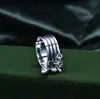 Anillo de plata de ley S925 de nicho multicapa para dedo índice femenino calavera cruz personalidad colgante retro borla moda al por mayor
