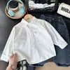 Nueva Ropa Infantil Estilo Primavera y Otoño Camisa Blanca de Trabajo para Niños Camisa de Manga Larga para Estudiantes Ropa de Presentación Venta al por Mayor