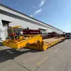 Semirreboque de plataforma baixa de 5 linhas e 10 eixos com direção hidráulica multi-rolamento de alta resistência para manobras flexíveis