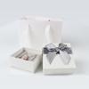 Directo de fábrica coreano más vendido caja para collar con anillo moda creativa moño caja de joyería lisa entrega en una sola pieza
